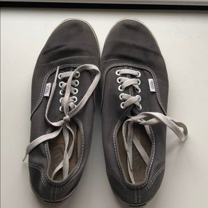 Grey Vans with white laces